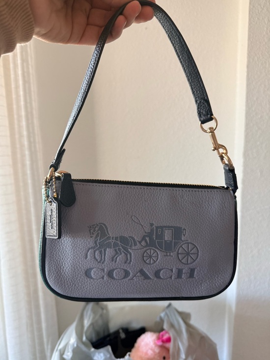Coach Handbags - Coach Lavender Leather Mini Wristlet with Black Strap
